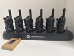 6 Motorola CLS1410 Two-way Radios With Charger, 9 Earpieces & Belt Clips. Fixed Price $225.00.
