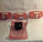 4 New Genuine Macom Harris Jaguar 700P P7100 P7200 Radio Battery Charger Sleeve. Fixed Price $69.99.