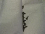 Motorola 0305941K01 Screw, Bottom Battery Plate HT600 MT1000 (LOT#PX301). Fixed Price $8.99.