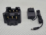 Radioboss 607 Single-unit Walkie Talkie Charger W/ Spare Battery Slot. Fixed Price $28.95.