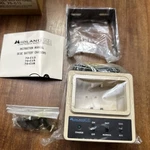 New Old Stock Midland Mobile Radio Battery Charger 70-C13 Unused. Fixed Price $60.00.