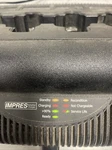 Motorola NNTN7064B Impres Dock Rack Multi-unit Adaptive Two-way Radio Charger. Fixed Price $99.00.